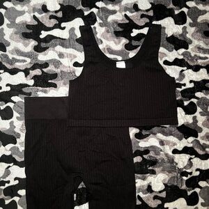 black workout set shorts and sports bra size L